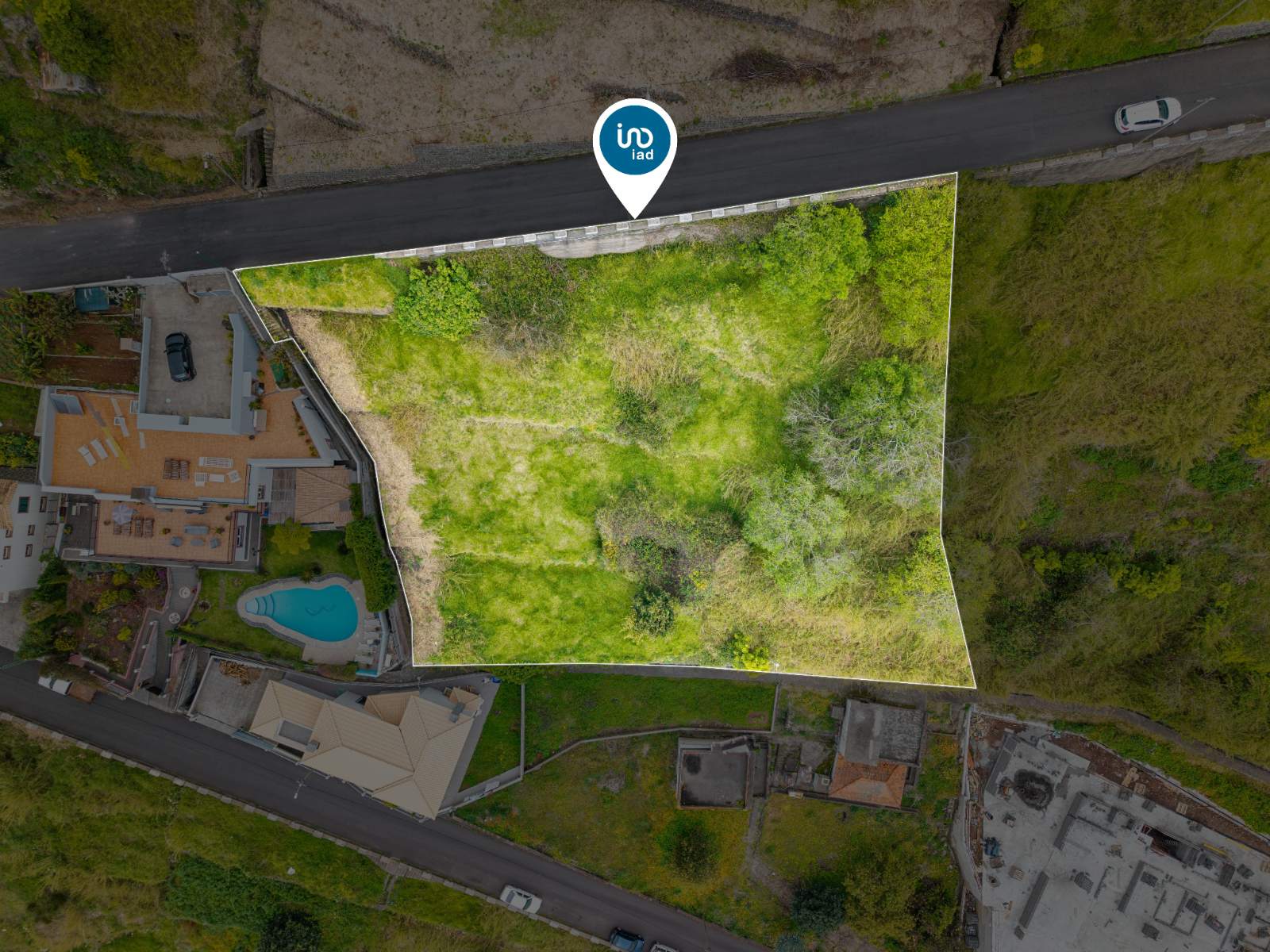 Overhead view of the plot boundary outlined in white, taken from directly above